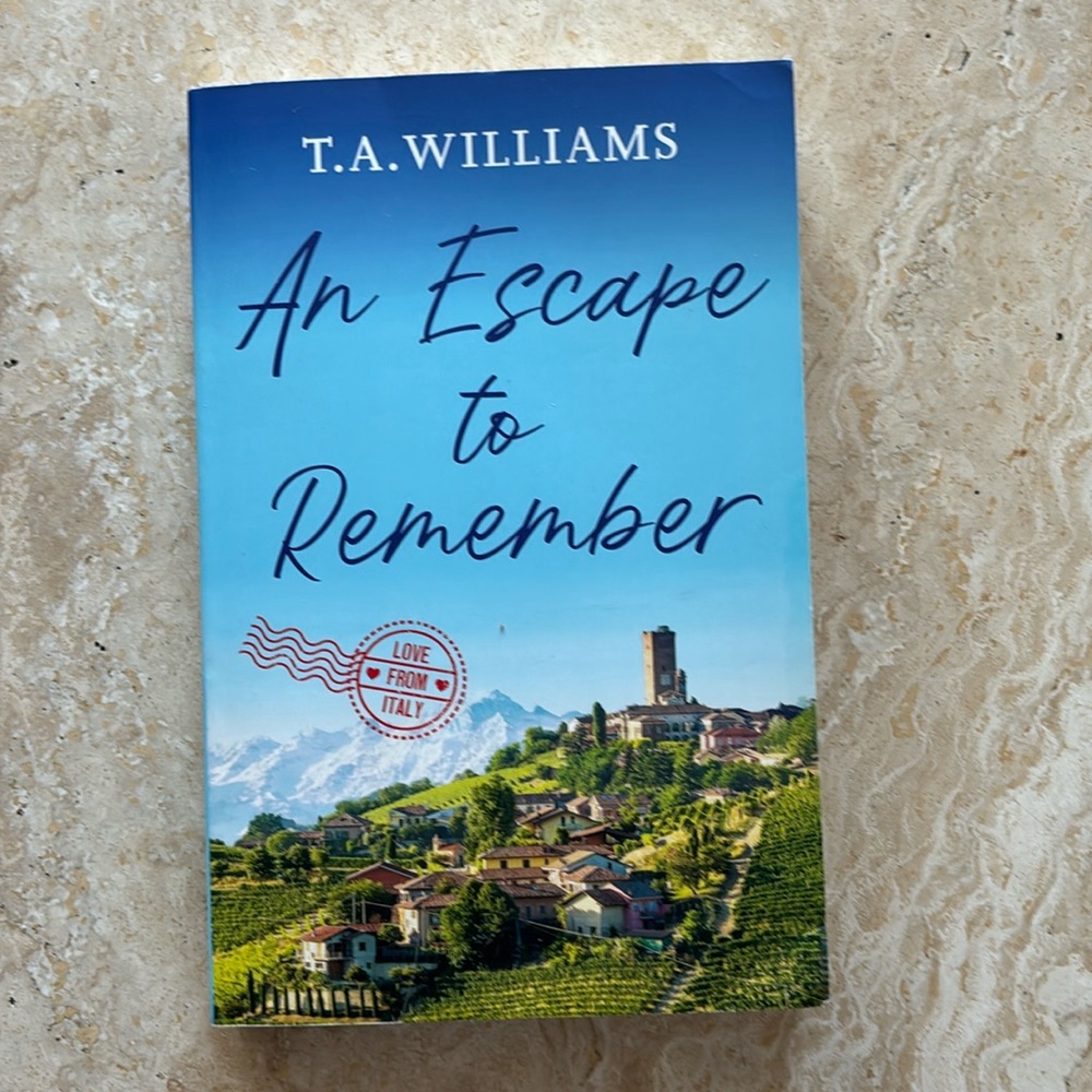 Paperback book, titled an escape to remember by T.A. Williams